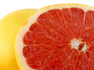 Slices of a grapefruit. A close up. Isolated on a white.