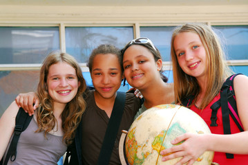 Portrait of a group of young smiling school girls