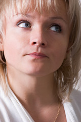 portrait of the serious girl with blue eyes