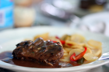 tenderloin beef steak on white plate with potatoes 