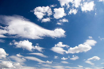 High contrast blue sky with clouds.