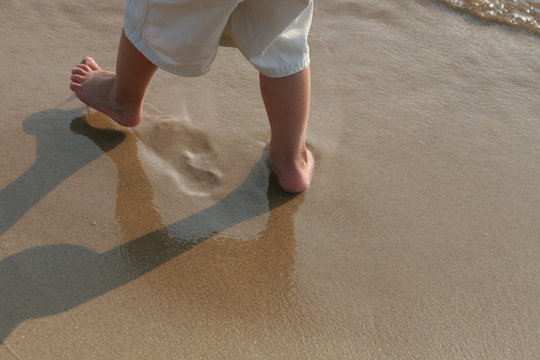 Baby Feet In Sand And Water