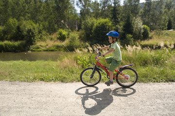 little boy on the bike