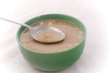 soup with bread croutons and mushrooms