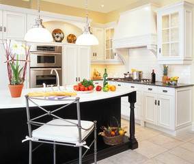 Beautiful white kitchen with vegetables