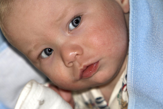 Close up of a blue eyed baby