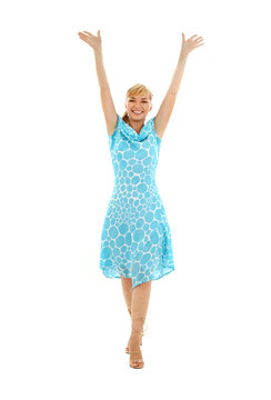 picture of happy girl in blue dress with hands up