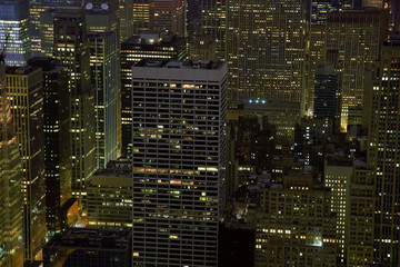 Office buildings at night in New York City.