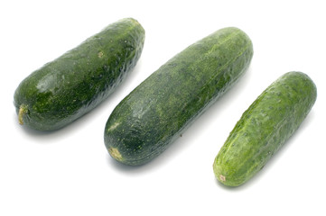 series object on white food - Three cucumbers