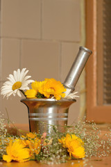 An image of mortar and flowers jhys