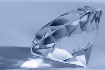 Fototapeta na wymiar Close-up of shiny diamond. Shallow DOF. Space for text..