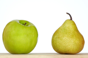 Fresh green apple and pear. Isolated on white background..