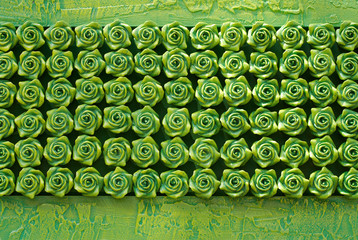 Close-up of stone green roses as abstract background..