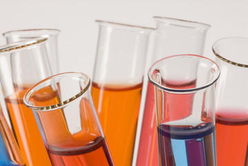 close-up of test tubes with colorful liquids
