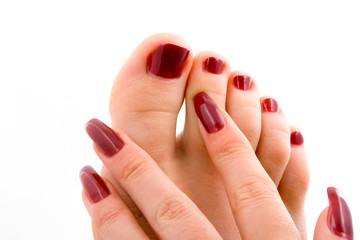 Naklejka premium Woman feet massage isolated in white background.