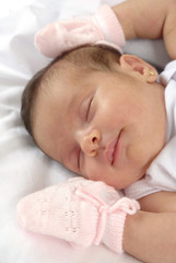 Baby having a sweet dreams .
