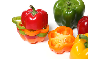 Mixed vegetables peppers over a white background
