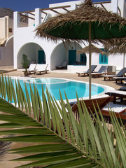 beautiful swimming pool by the beach in kamari