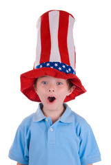 Young boy wearing a stars and stripes patriotic top