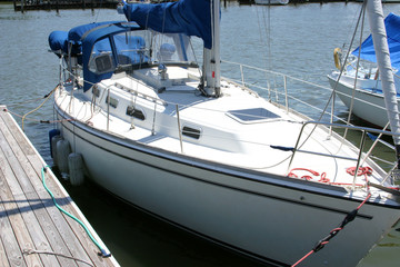 Sailboat docked at a marina