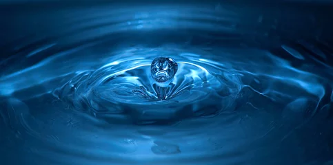 Foto op Aluminium An image of drop of water close-up kkk © Mykola Velychko