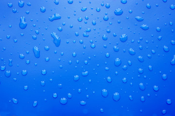 water drop texture in blue background