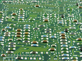 Hi-tech background. Resistors. Prevalence green. A close up. 