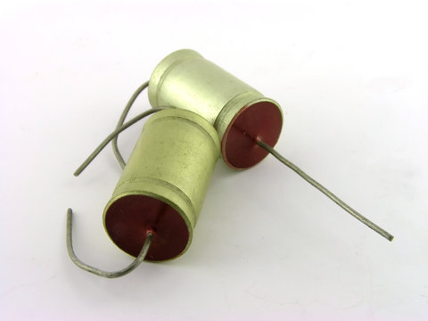 Capacitors. A close up. It is isolated on a white background.