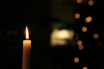 candle burning at christmas