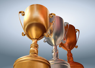 Rendered three cups (gold, silver, bronze) on blue background