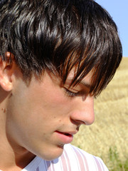 Obraz premium Portrait of a twenty years old dark-haired boy