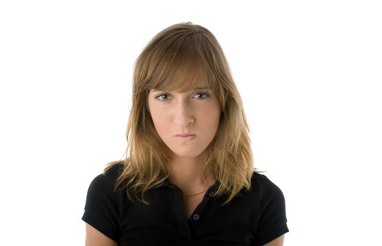 Young woman with displeased expression on her face