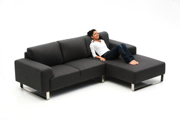sofa, designermöbel, frau auf einem sofa