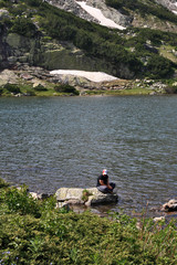 mountain lake and a girl