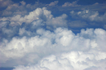 great number of clouds on sky with view above clouds