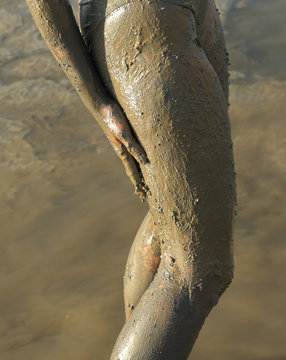 half naked woman add dead sea clay 