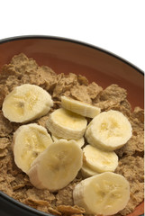 breakfast cereal with bananas and milk wheat rice flakes slices