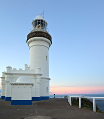 the old lighthouse at byron bay standing tall at sunset © clearviewstock