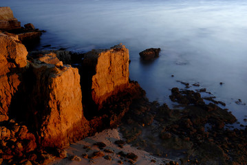 Long Exposure of sea over rocks - dreamy feel
