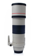 Camera telephoto lens reflected on the white background