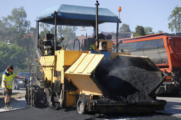 paving machine asphalting the road