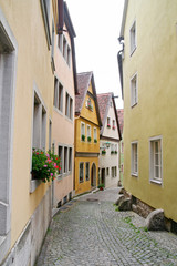 Fototapeta na wymiar A picturesque alley in the town of Rothenburg, Germany