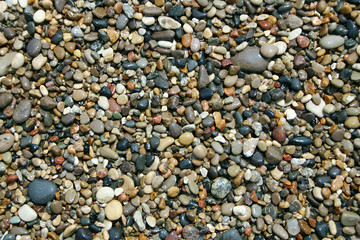 Smooth stones on the beach