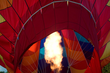 Obraz premium Filling a colorful Hot Air Balloon with Gas and flames