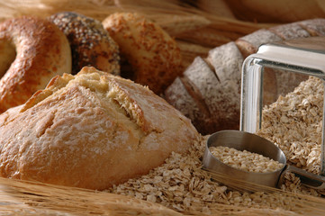 A counter heaped with fresh breads 