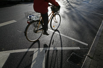 Urban cyclist in early morning light.