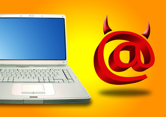 Laptop and Email symbol in devil shape