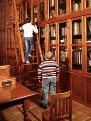 the two boys in the large laibrary