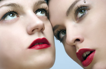 two beaytiful ladies with sensual red lips