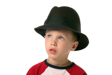 a boy with hat is looking